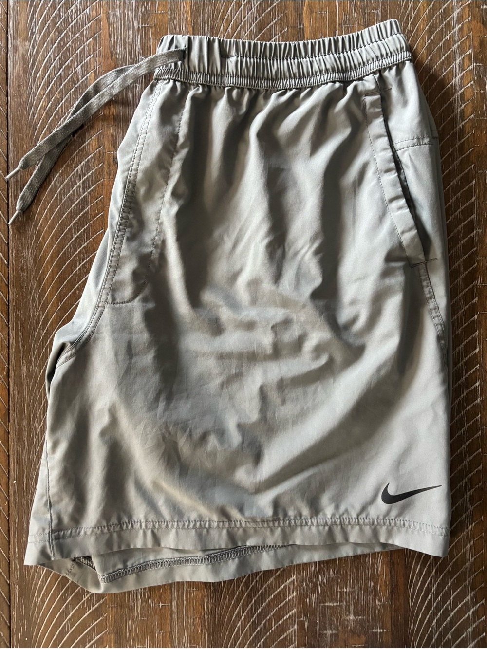 Nike Men’s gray Athletic Shorts with Black Swoosh